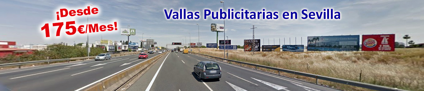 una autopista con vallas publicitarias a los lados